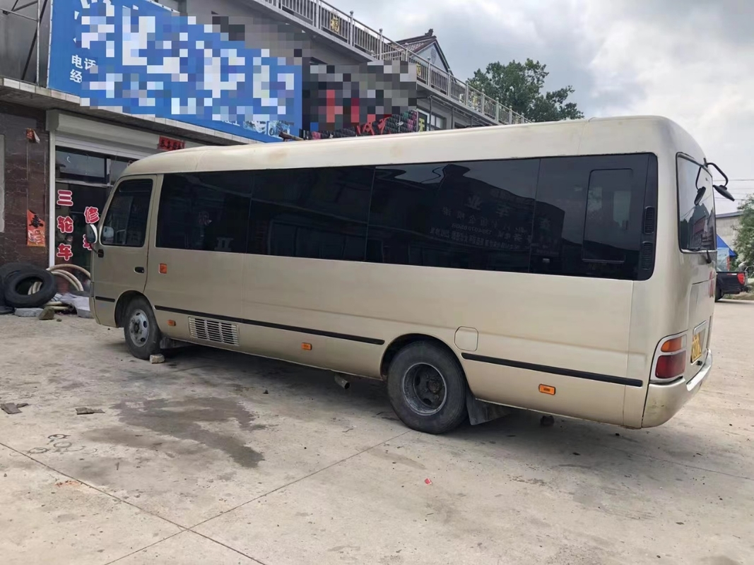Toyota Mini Used Coaster Bus With saiu porta do passageiro de 23 assentos 1Hz motor diesel