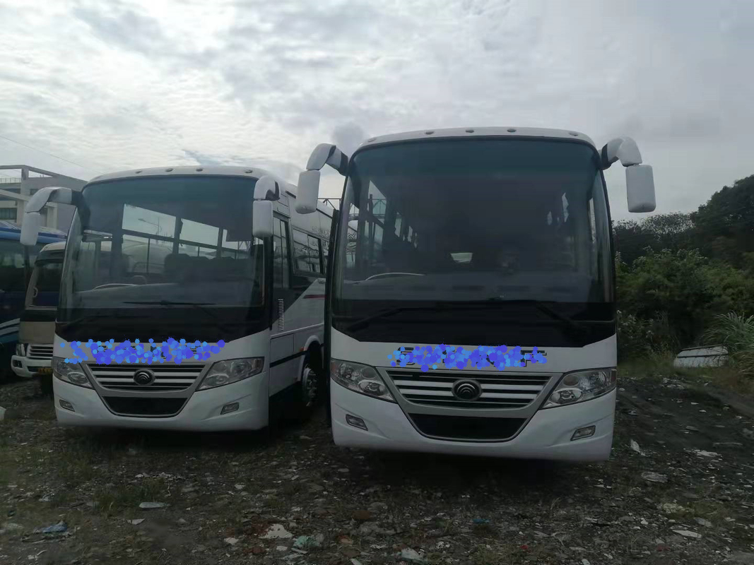 RHD/LHD usou o treinador Bus 2+3layout 60seats com suspensão abundante Yutong ZK6112D da mola de placa