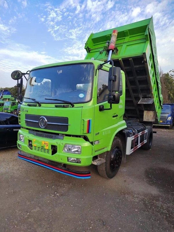 O descarregador usado deixado do tipo 4x2 de Dongfeng do caminhão basculante usou caminhões basculantes leves do dever