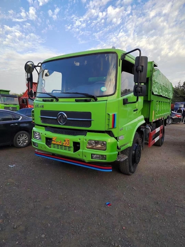 O descarregador usado deixado do tipo 4x2 de Dongfeng do caminhão basculante usou caminhões basculantes leves do dever