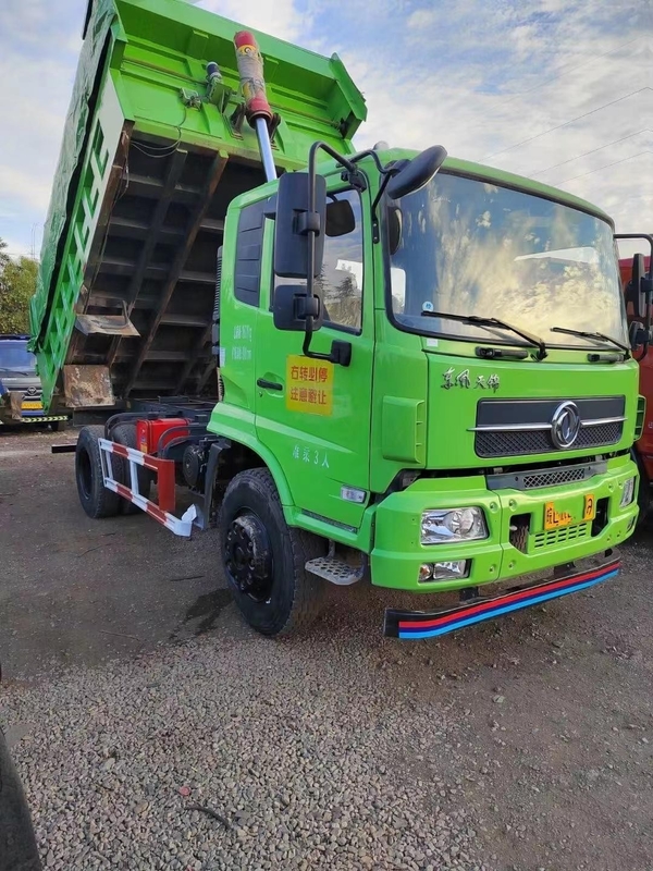 O descarregador usado deixado do tipo 4x2 de Dongfeng do caminhão basculante usou caminhões basculantes leves do dever