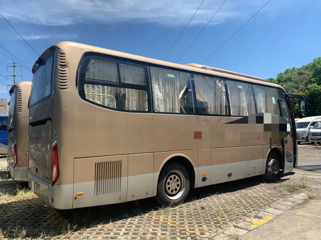 Treinador usado Bus Weichai Engine 34 assentos uma cor dourada de 2018 anos 8 medidores de ?a mão Kinglong XMQ6802