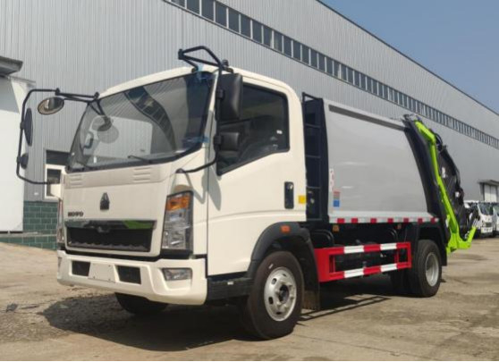 O ³ de Commercial Vehicles 8m do comerciante do caminhão que carrega o modo HOWO da movimentação 4×2 comprimiu o caminhão de lixo 7,5 medidores por muito tempo