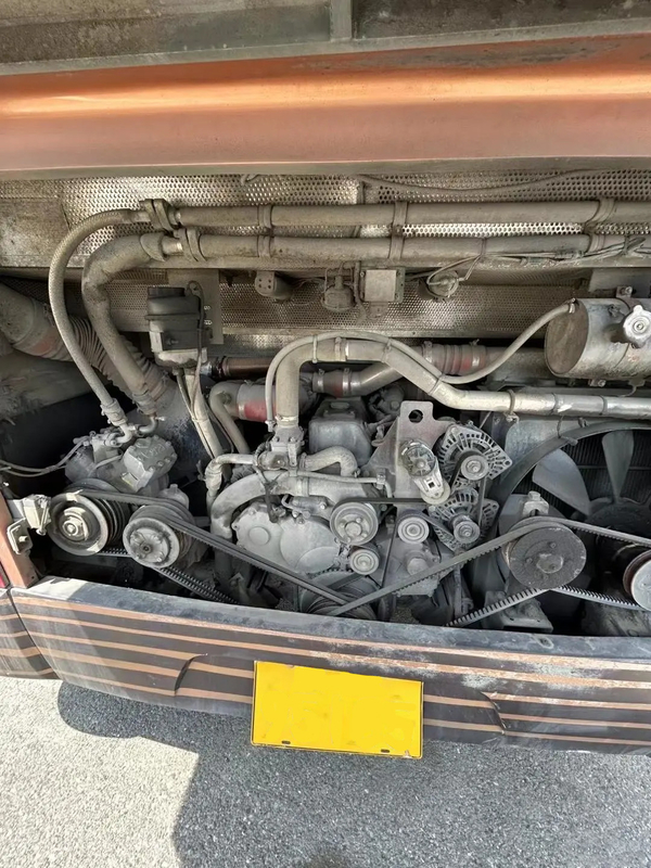 Ônibus de luxo de segunda mão 39 lugares Cor dourado Euro 4 Motor Yuchai Ônibus dourado dragão XML6907