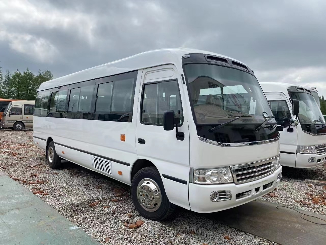 Autocarro usado de montanha-russa Mudan Minibus 30 lugares Direito Direito Direito Uso na Tanzânia Primavera de folhas para estrada ruim