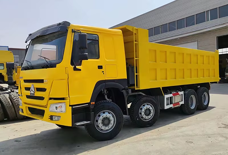 Usado caminhão basculante Howo 371hp 8x4 com volante à esquerda Motor Diesel WP AC 12 rodas para o Zimbabué
