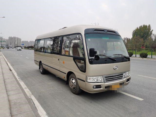 2015 o ônibus mais alto usado da pousa-copos do ano 10 assentos, usou Mini Bus Coaster Bus 86kw com assentos luxuosos para o negócio