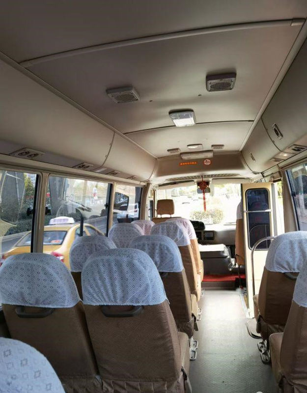 2010 ônibus usado da pousa-copos do ano 20 assentos, ônibus usado de Mini Bus Toyota Coaster com o motor de gasolina 2TR nas boas condições