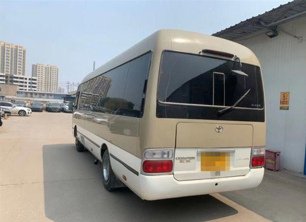 O ônibus usado 20 assentos da pousa-copos usou Mini Bus Toyota Coaster Bus com o motor de gasolina 2TR direção da mão esquerda de 2007 anos