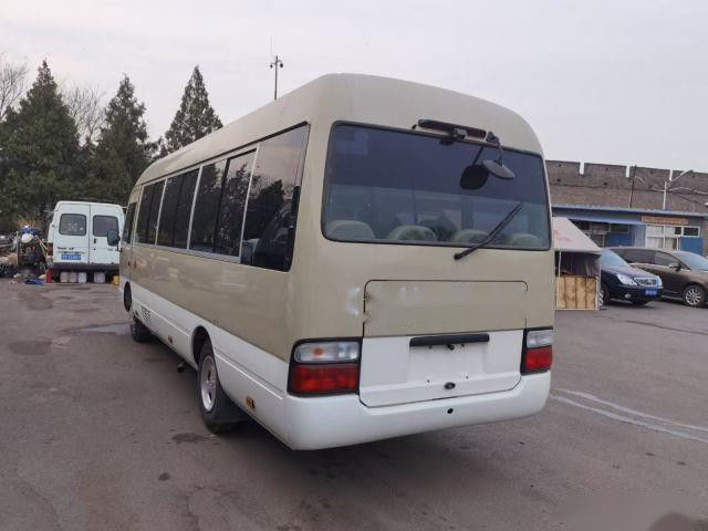 Quilômetro usado movimentação usado do ônibus do passageiro da mão esquerda da gasolina dos assentos da pousa-copos 20 do ônibus de Toyota baixo