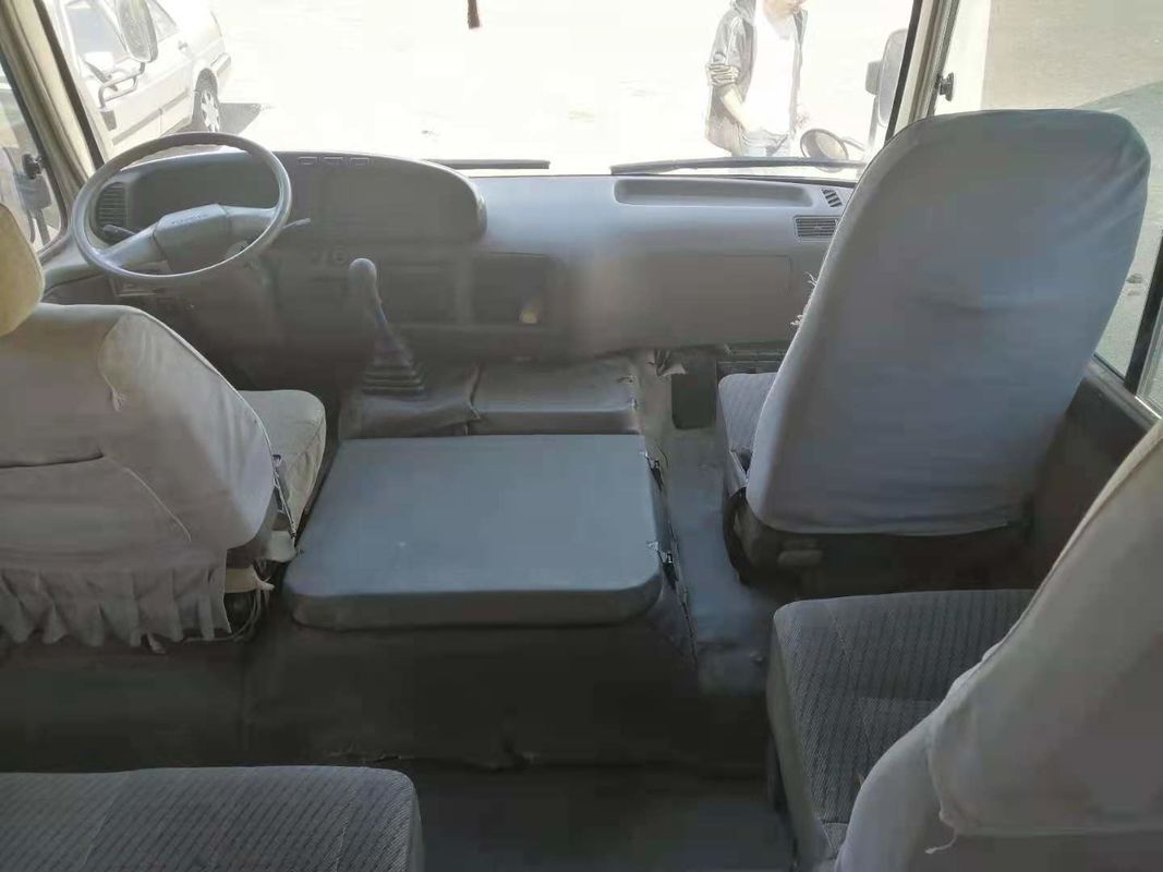 Pousa-copos japonesa usada ônibus usada baixo quilômetro do tipo do ônibus da pousa-copos do passageiro da movimentação da mão esquerda do motor diesel 1HZ 23-29seats