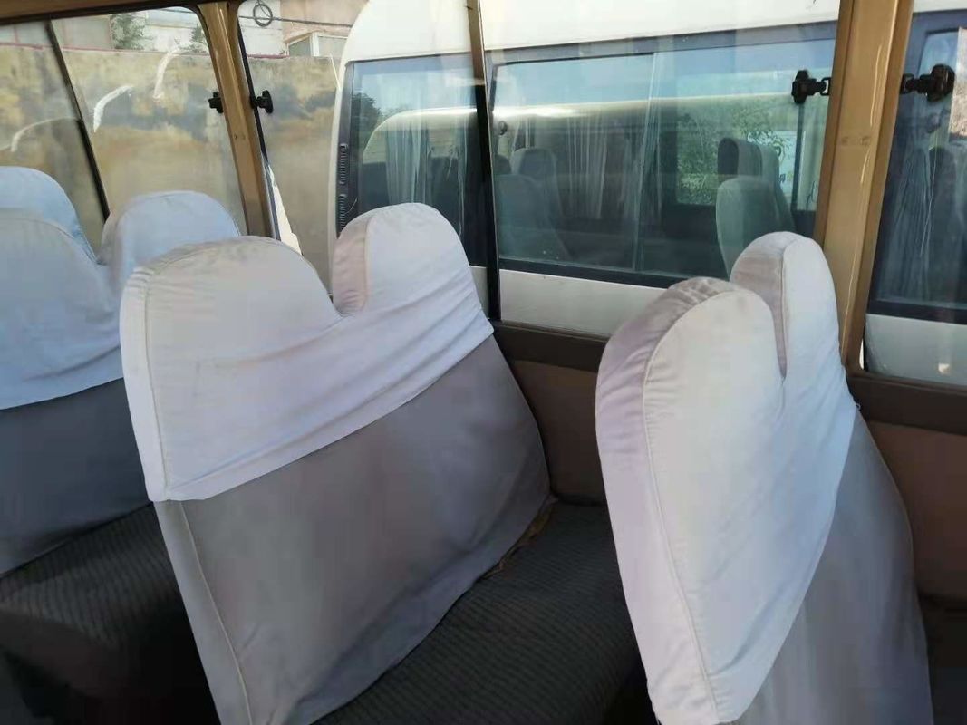 Pousa-copos japonesa usada ônibus usada baixo quilômetro do tipo do ônibus da pousa-copos do passageiro da movimentação da mão esquerda do motor diesel 1HZ 23-29seats