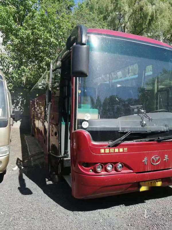 As portas dobro usadas da bolsa a ar do chassi 48seats do ônibus NEOPLAN de Youngman sairam motor traseiro do ônibus usado de direção do passageiro