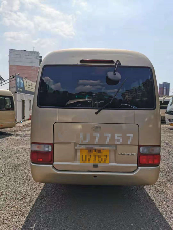 O ônibus usado 23 assentos da pousa-copos usou Mini Bus Toyota Coaster Bus com o motor de gasolina 3RZ direção da mão esquerda de 2012 anos