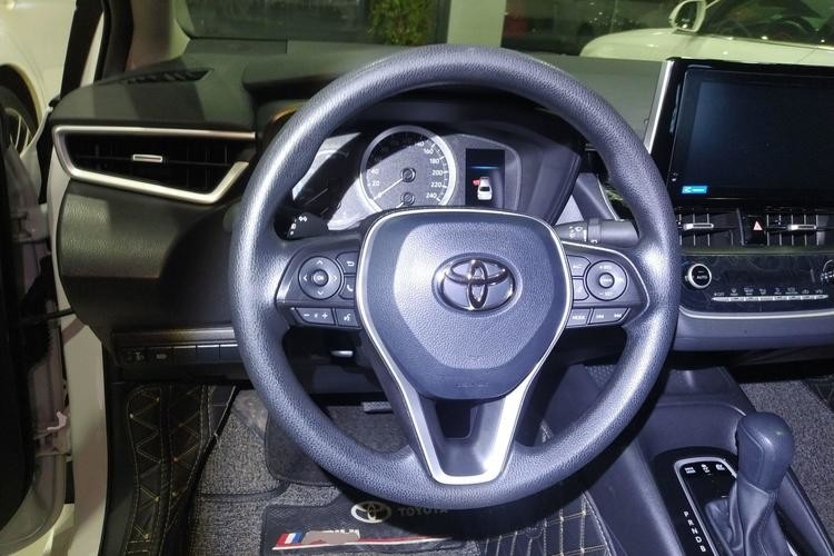 Veículo usado de New Energy do carro de Corolla com o carro branco do sedan das portas da cor 4 dos assentos do pioneiro 5 de Corolla 20191.2T S-CVT