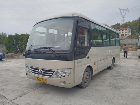 A porta de dobradura 28seater do ônibus ZK6729D 130hp de Mini Tour Coach Used Yutong saiu da direção