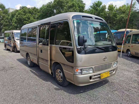 O ônibus usado 23 assentos da pousa-copos usou Mini Bus Toyota Coaster Bus com o motor de gasolina 3RZ direção da mão esquerda de 2012 anos